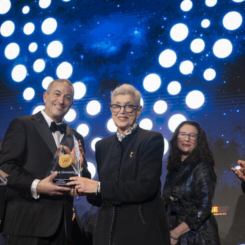 Rabbi Dr. Ari Berman awards the Katz family the Second Century Medallion at the 101st Annual YU Hanukkah Dinner